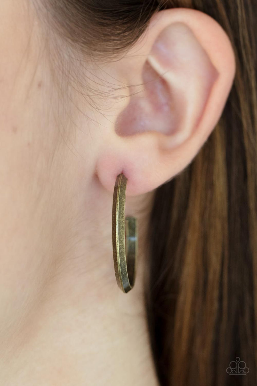 On The Brink - Brass Hoop Earrings - Paparazzi Accessories - A raised spine on an antiqued brass hoop creates a dramatic finish to the simple design. Earring attaches to a standard post fitting. Hoop measures approximately 1" in diameter. Sold as one pair of hoop earrings.