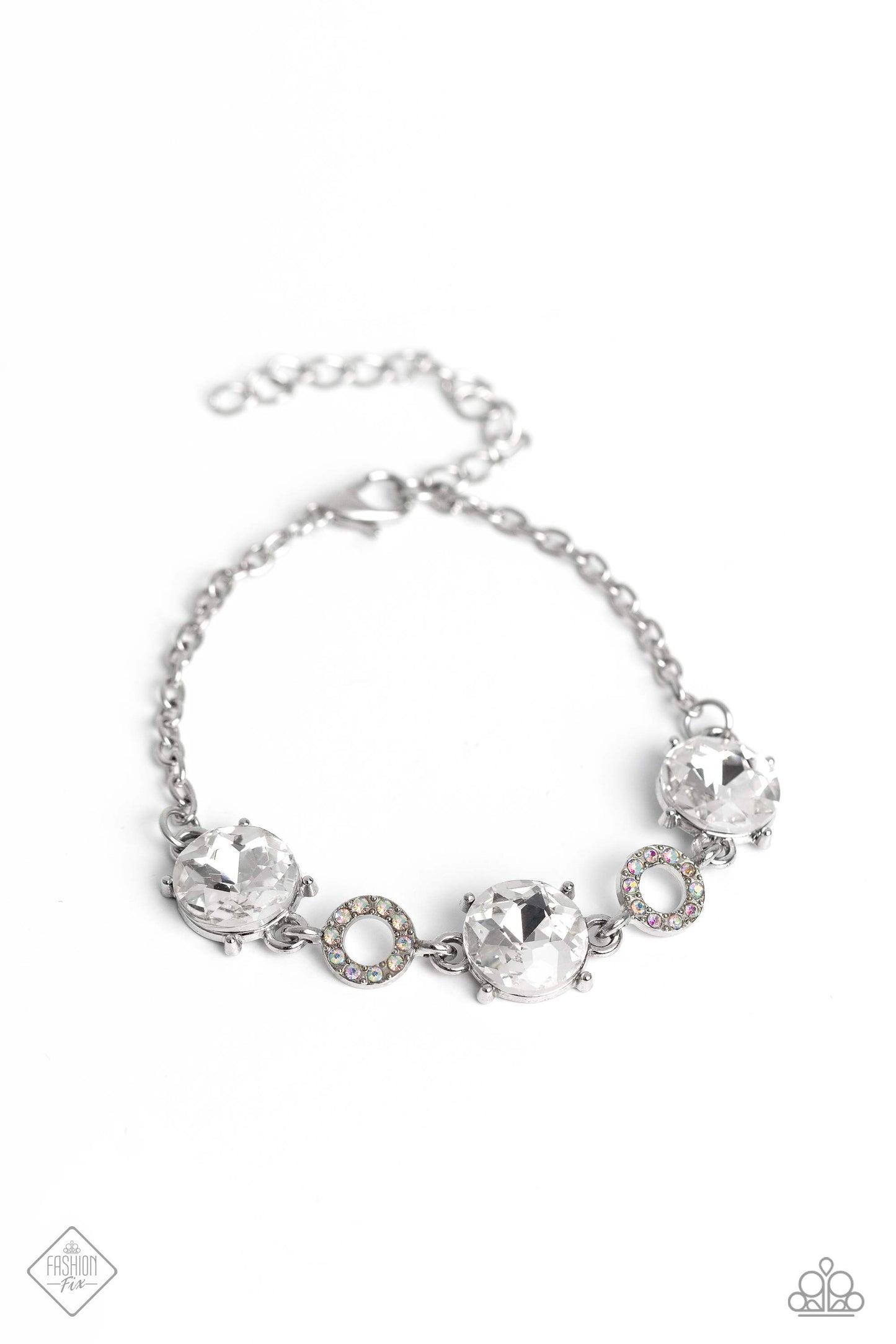 Once Upon A Treasure - White and Silver Bracelet - Paparazzi Accessories - A collection of dramatically pronged and highly reflective white gems alternate with silver rings embossed in iridescent rhinestones, emphasizing the sheen from each element as they link around the wrist. Due to its prismatic palette, color may vary. Sold as one individual bracelet.
