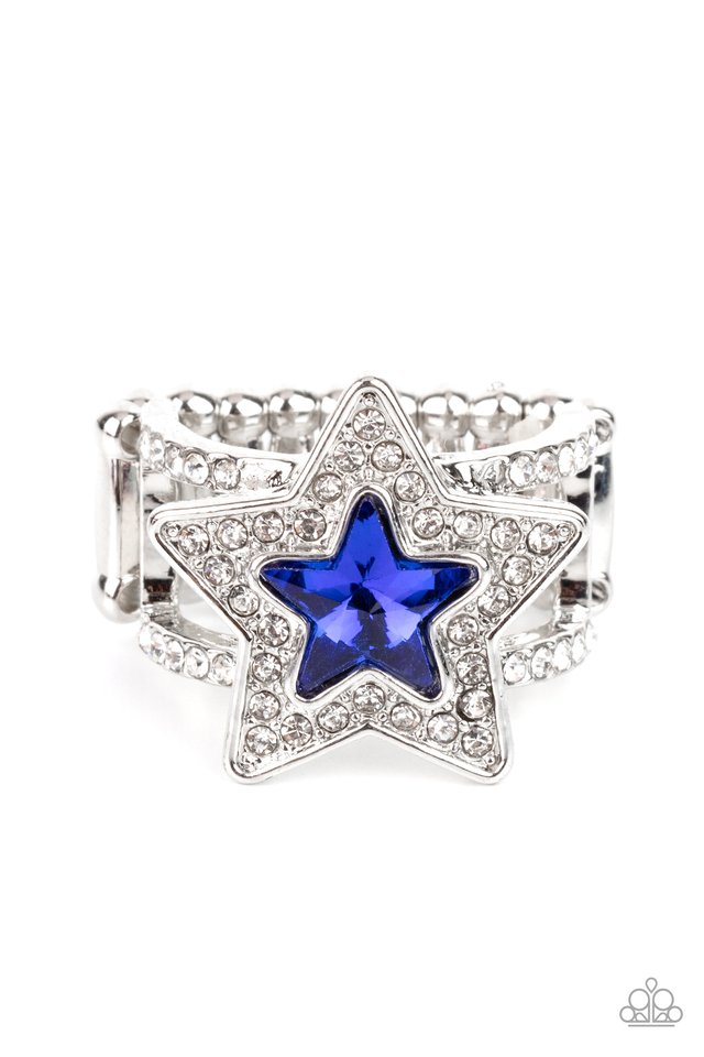 One Nation Under Sparkle - Blue and Silver Ring - Paparazzi Accessories - A star shaped blue gem is pressed into the center of a silver star dotted in blinding white rhinestones, creating a stellar centerpiece atop two white rhinestone encrusted silver bands. Features a stretchy band for a flexible fit. Sold as one individual ring.