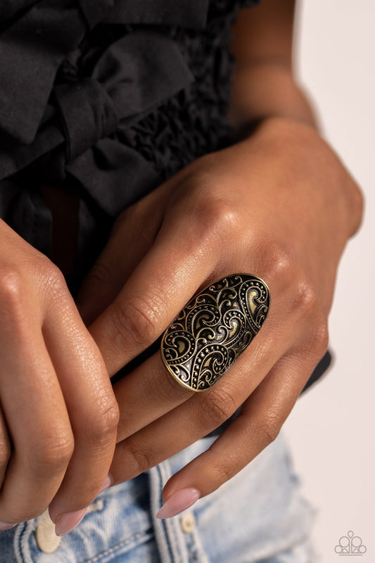 PAISLEY for You - Brass Fashion Ring - Paparazzi Accessories - Embossed in a studded paisley pattern, a thick brass frame folds around the finger for a whimsically vintage look. Features a stretchy band for a flexible fit. Sold as one individual ring.