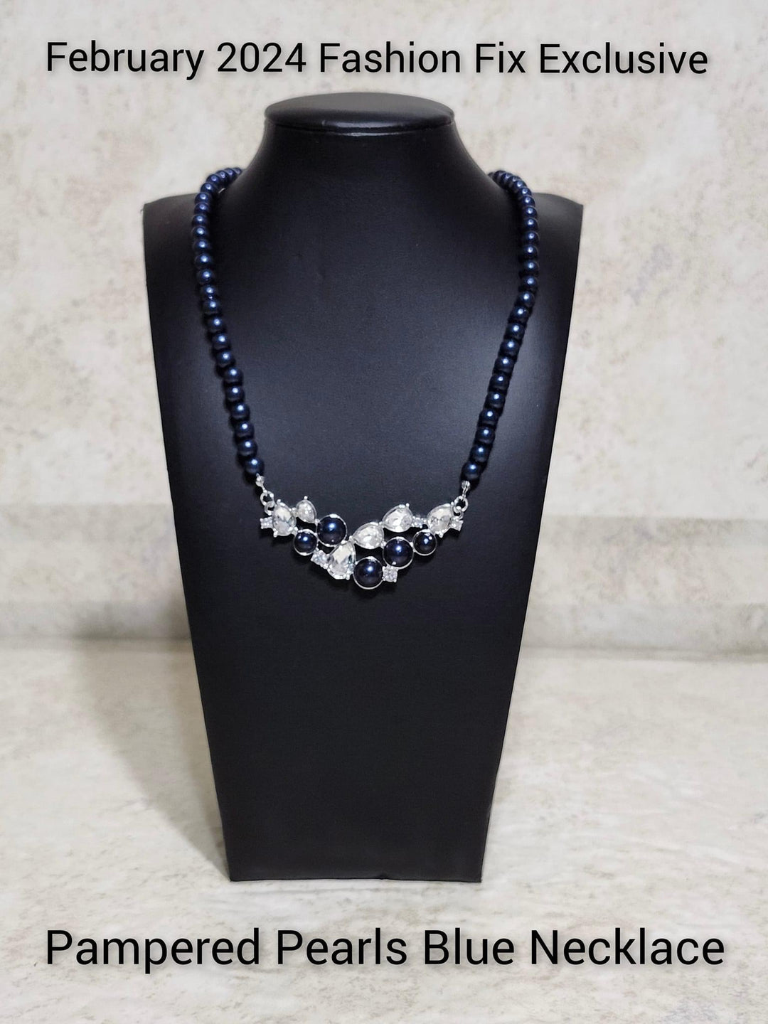 Pampered Pearls - Blue Necklace - Paparazzi Accessories - A single strand of navy pearls elegantly cascades below the collar to meet a refined collection of navy pearls in varying sizes and white gems pressed in round and teardrop frames for a sparkly finish.