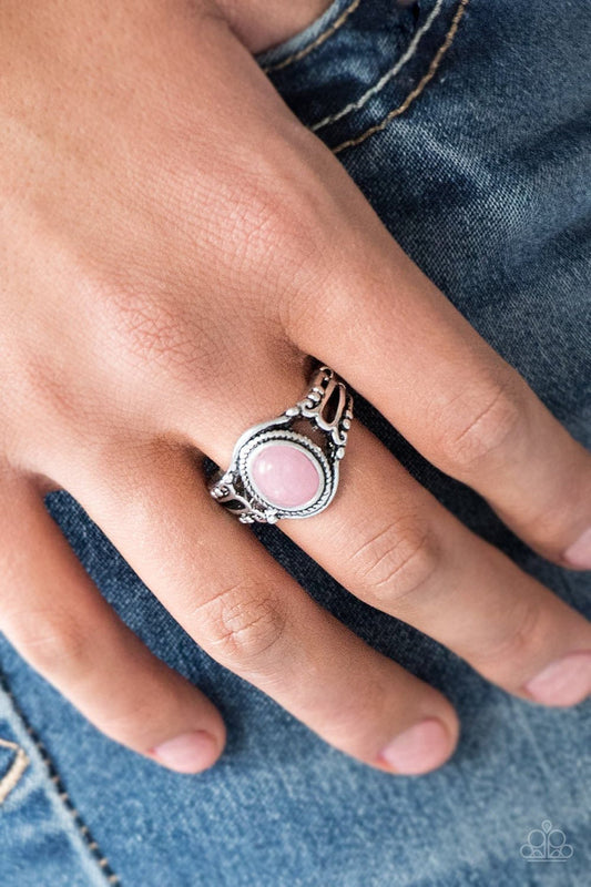 Peacefully Peaceful - Pink and Silver Ring - Paparazzi Accessories - A tranquil pink stone is pressed into the center of a studded silver band for a seasonal look. Features a dainty stretchy band for a flexible fit. Sold as one individual ring.