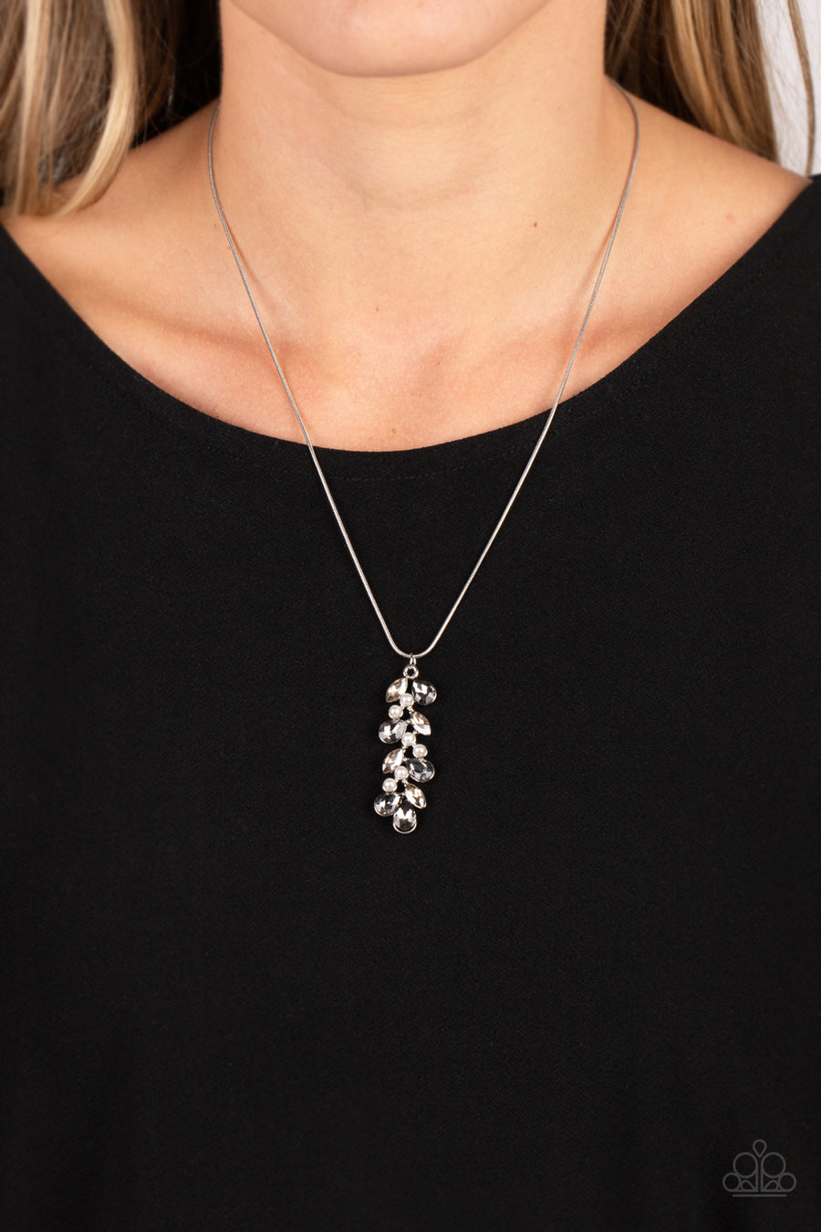 Pearls Before VINE - Silver Necklace - Paparazzi Accessories - Dainty faceted jet black teardrops- and smoky marquise-cut gems climb around clusters of dainty white half-pearls, creating an elongated pendant that slides elegantly along a skinny silver snake chain.