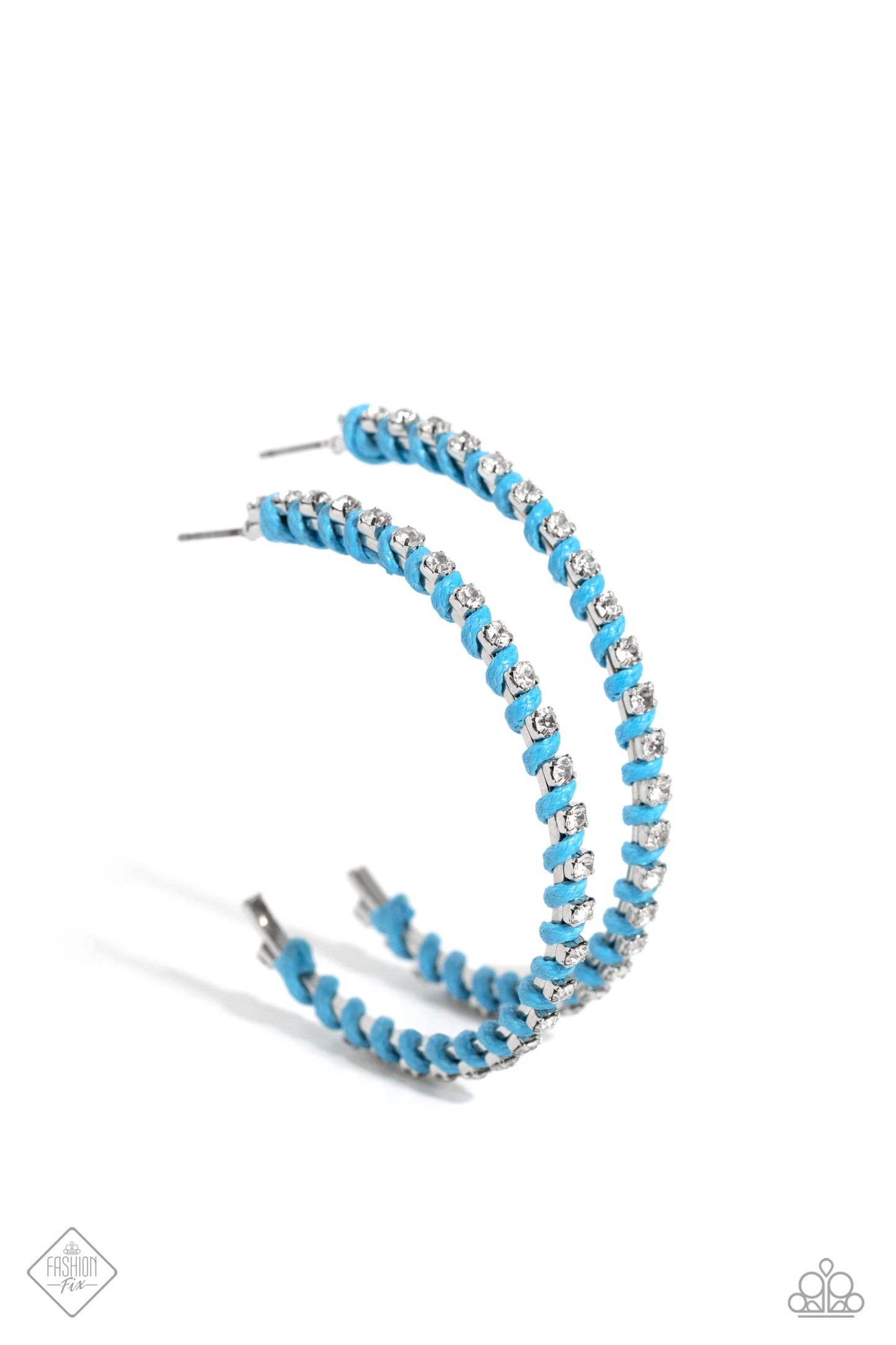 Put a STRING on It - Blue and Silver Hoop Earrings - Paparazzi Accessories - The outer edge of an oversized silver hoop is lined with classic white rhinestones, scattering sparkle in every direction. A strand of blue cording intricately twists and weaves in between the glitzy gems, adding a fearless pop of color to the design. Earring attaches to a standard post fitting. Hoop measures approximately 2″ in diameter. Sold as one pair of hoop earrings.