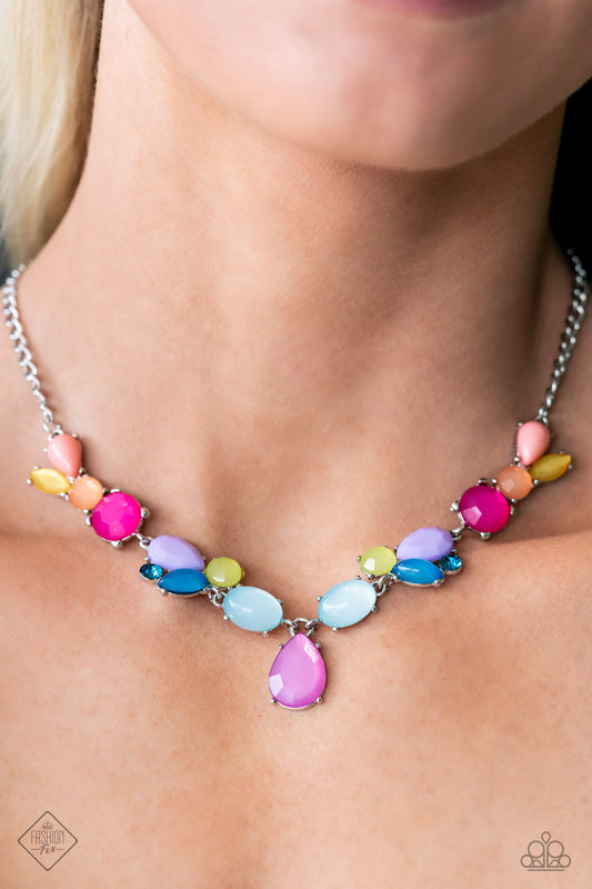 Puzzled Production - Multi Color Necklace - Paparazzi Accessories - Featuring Pantones® Peach Pink, Pink Peacock, Waterspout, and Love Bird, a geometric cluster of beads in varying opacities and shapes are encased in pronged silver frames as they haphazardly taper into a colorful lure down the collar. Each shape flares and flirts around the neckline, reflecting light off its every faceted and high-sheen surface for a fun-loving finish.