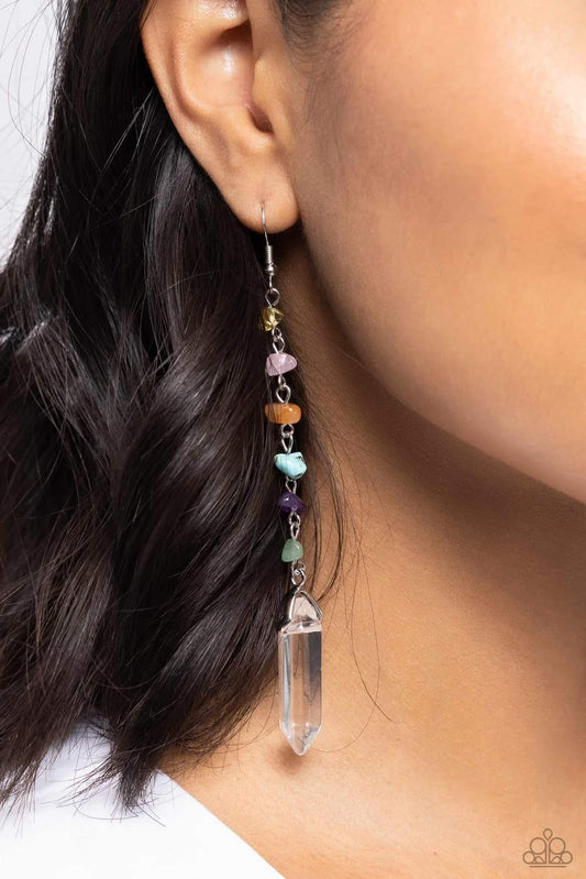 Quartz Qualification Multi Color Earrings - Paparazzi Accessories - Chiseled multicolored stones connect down the ear along a silver chain, leading the eye to a clear quartz-like piece at its end for an elegantly earthy lure. Earring attaches to a standard fishhook fitting.