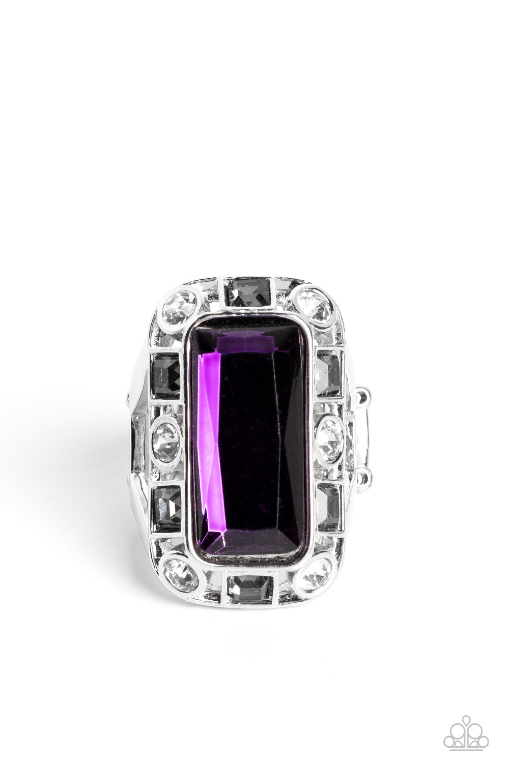 Radiant Rhinestones - Purple and Silver Ring - Paparazzi Accessories - Pressed into a curved, rectangular silver frame, an oversized emerald-cut purple gem shines atop the finger. Dainty square and round gems in shades of white and smoky black airily encircle the oversized gem for some additional shimmer resulting in a radiant centerpiece ring.