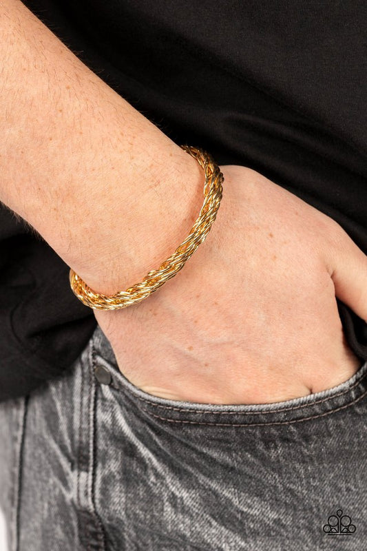 Rally Together - Gold Urban Cuff Bracelet - Paparazzi Accessories - Glistening gold wires twist and coil into a single cuff around the wrist, resulting in a gritty edge. Sold as one individual bracelet.