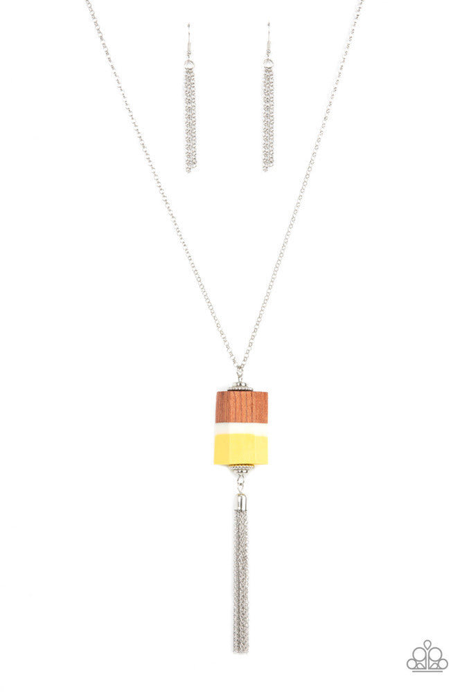 Reel It In - Yellow and Silver Necklace - Paparazzi Accessories - Infused with silver beaded accents, pieces of yellow and brown wood and a white acrylic accent delicately stack into a faceted geometric pendant at the bottom of an extended silver chain. A shimmery silver chain tassel dances from the bottom of the earthy display, adding whimsical movement to the colorful piece.