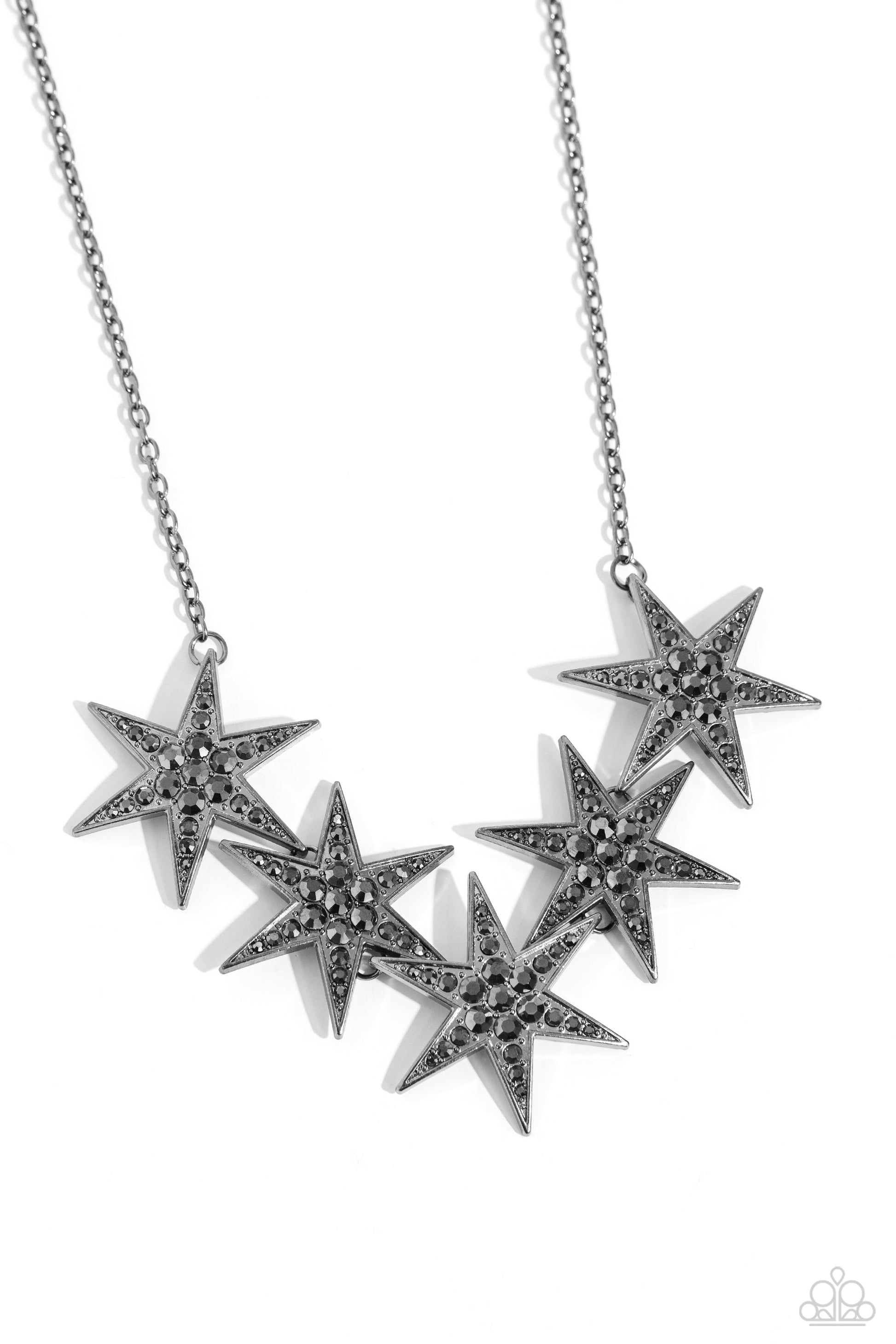 Rockstar Ready - Black Gunmetal Star Necklace - Paparazzi Accessories - Dotted with various sizes of highly reflective hematite rhinestones, a stellar collection of 3D gunmetal stars interlock from a dainty gunmetal link chain for an out-of-this-world edgy fashion.