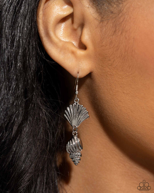 SHELL, I Was In the Area - Silver Earrings - Paparazzi Accessories - Textured silver seashells dangle and connect below the ear, creating a coastal centerpiece. Earring attaches to a standard fishhook fitting. Sold as one pair of earrings.