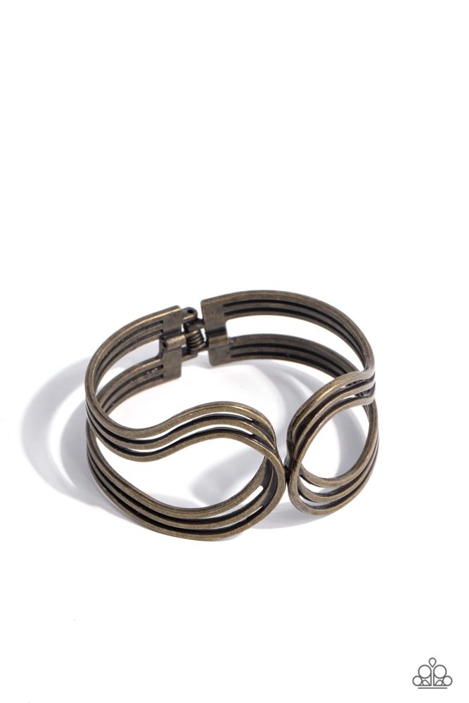 Shockwave Attitude - Brass Bracelet - Paparazzi Accessories - Featuring a rustic finish, flat brass bars delicately loop and overlap into two airy brass frames around the wrist that delicately connect into a layered bangle-like bracelet. Features a hinged closure. Sold as one individual bracelet.