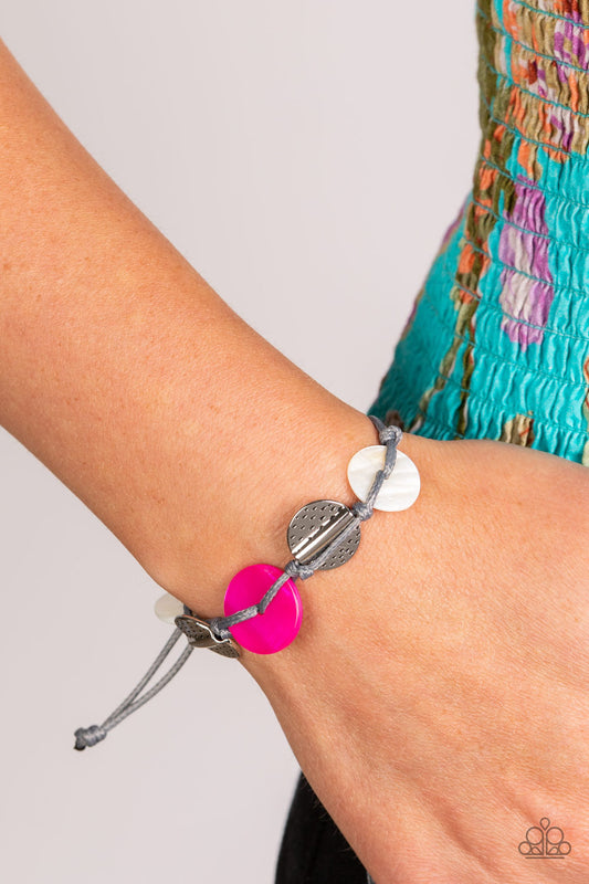 Shore Up - Pink Shell and Silver Bracelet - Paparazzi Accessories - Vibrant pink and white shells interlace with silver dotted, hammered discs to create a refined pop of color. Held together by soft gray cording, this piece will blend in with beaches near you! Features an adjustable sliding knot closure. Sold as one individual bracelet.