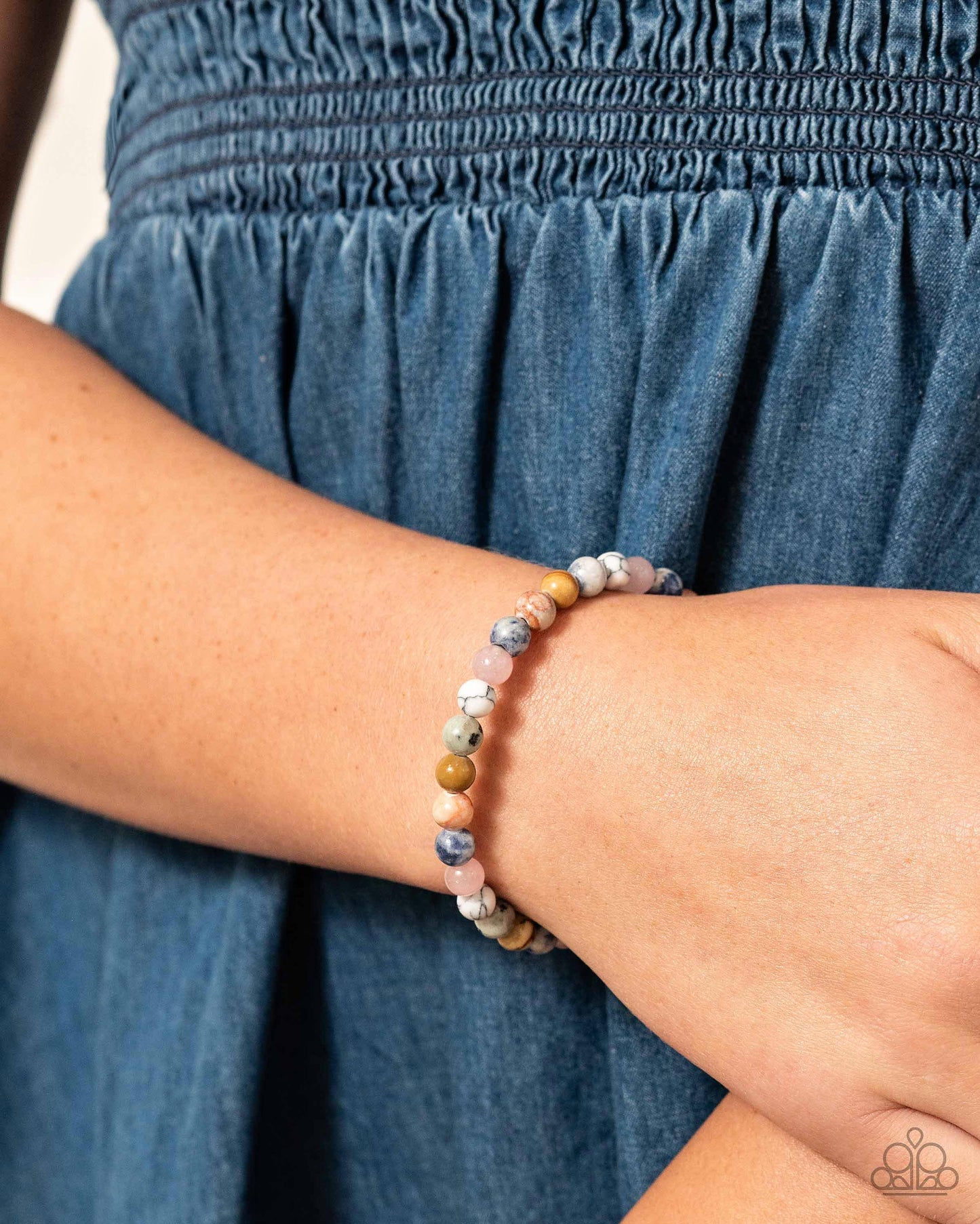Sinuous Stones - Multi Color Bracelet - Paparazzi Accessories - Multicolored stone beads and two shimmery silver beads are threaded along a coiled wire to create a stackable earthy bracelet.