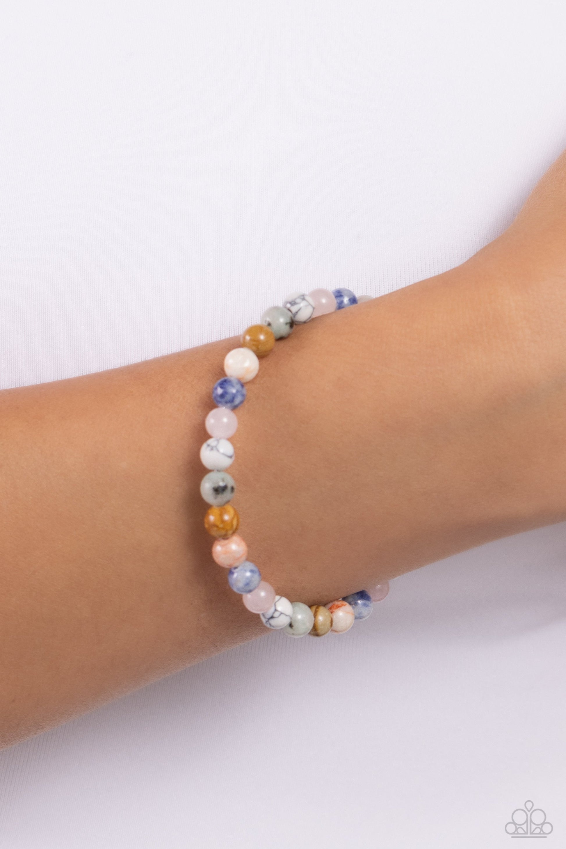 Sinuous Stones - Multi Color Bracelet - Paparazzi Accessories - Multicolored stone beads and two shimmery silver beads are threaded along a coiled wire to create a stackable earthy bracelet.