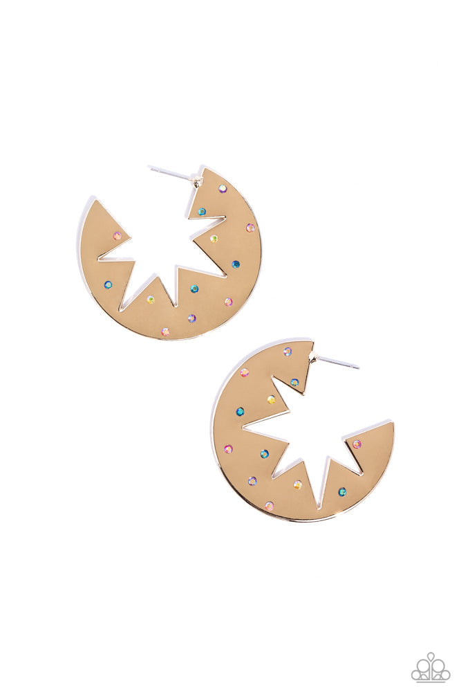 Starry Sensation - Gold Hoop Earrings - Paparazzi Accessories - Sporadically dotted with various multicolored and iridescent rhinestones, a three-dimensional star outline explodes from the center of a polished gold disc for an out-of-this-world centerpiece. Earring attaches to a standard post fitting. Hoop measures approximately 1 3/4" in diameter.