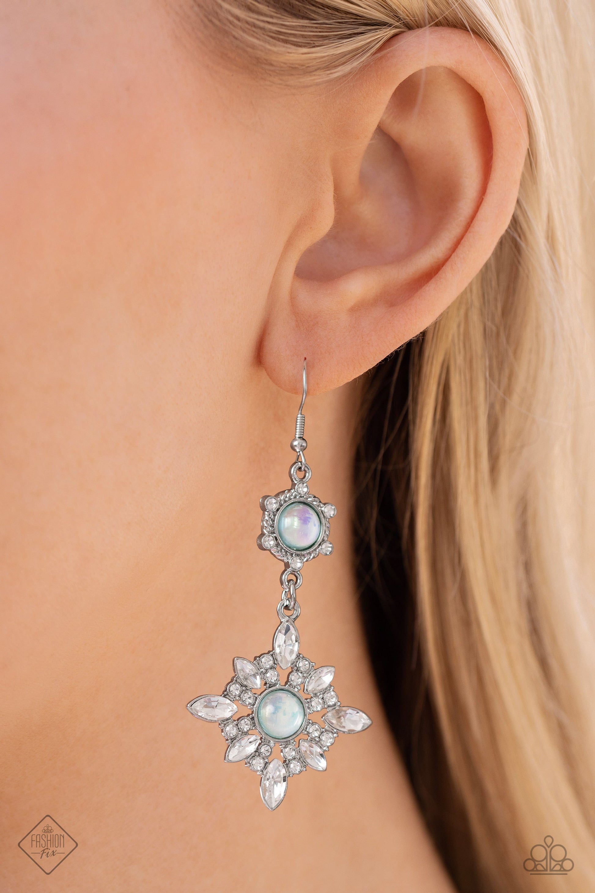 Summer DAZE - Green and Silver Earrings - Paparazzi Accessories - A spiral-textured silver frame featuring dainty white rhinestone accents and a glassy opalescent green bead center anchors a dazzling floral frame. The white marquise-cut gem petals and glassy opalescent center are accented by stacked white rhinestones, highlighting the handcrafted features and sheen of the design.