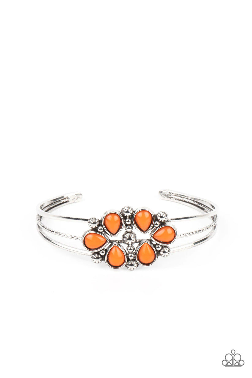 Taj Mahal Meadows - Orange and Silver Bracelet - Paparazzi Accessories - A whimsical collection of glassy orange teardrop beads, dainty silver studs, and silver floral accents coalesce into a colorful centerpiece atop a layered silver cuff.