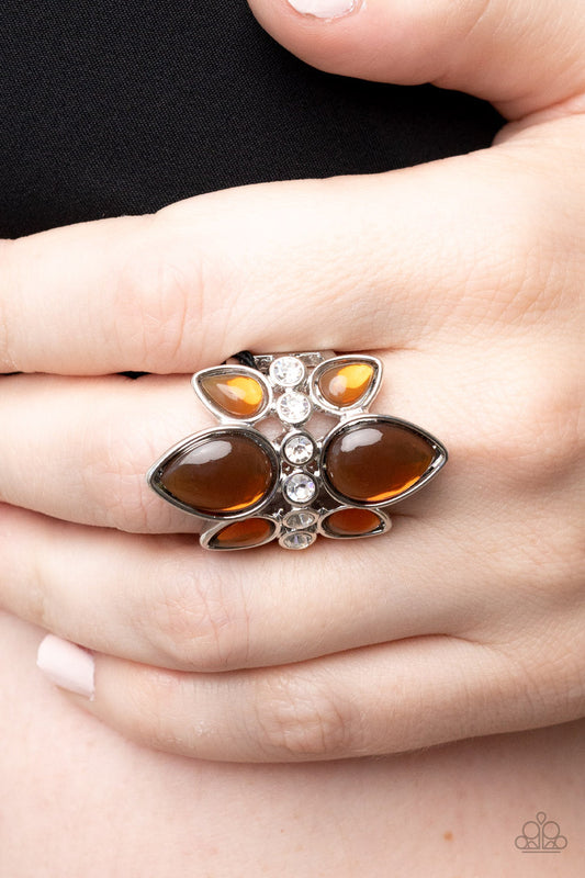 TRIO Tinto - Brown Ring - Paparazzi Accessories - Crowns of glassy brown teardrop beads fan out from a center of glassy white rhinestones, coalescing into an ethereal centerpiece atop the finger. Features a stretchy band for a flexible fit.