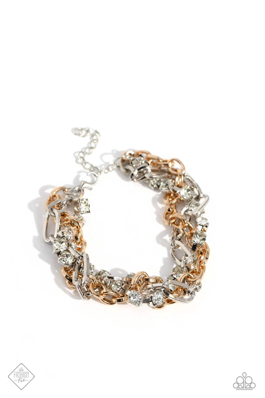 Two-Tone Taste - Multi Metal Bracelet - Paparazzi Accessories - Mismatched strands of glistening gold and silver oval links are intertwined with a row of sparkling, square-cut, white rhinestones encased in sleek silver fittings, resulting in a twisted collision of grit and glamour around the wrist.