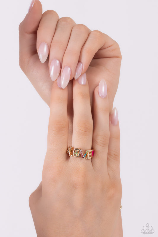 Unlimited Love - Gold Ring - Paparazzi Accessories - Glistening silver letters arc across the finger, forming the word "LOVE" for a causally romantic finish.