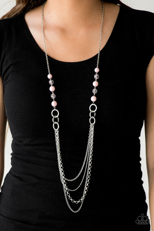 Vividly Vivid - Pink and Silver Necklace - Paprazzi Accessories - Polished pink, faceted crystal-like and delicately hammered silver hoops give way to mismatched silver chains down the chest for a whimsical look. Features an adjustable clasp closure. Sold as one individual necklace.