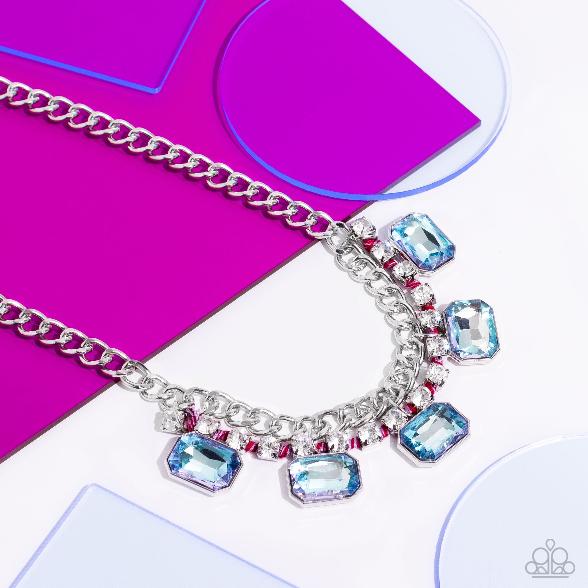 WEAVING Wonder - Multi Color Gem Necklace - Paparazzi Accessories - Brushed in a high-sheen finish, a strand of flat silver curb chain dramatically drapes across the chest for a bold industrial look. A row of faceted light blue emerald-cut gems cascade from the bottom of a strand of glittery white rhinestones set in silver square fittings and ornately woven in Viva Magenta and purple cording for a modern look.