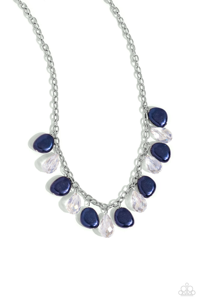 Welcome to BALL Street - Blue and Silver Necklace - Paparazzi Accessories - White crystal-like teardrops and oversized Montana baroque pearls drip from the bottom of a shimmery silver link chain, creating a refined fringe below the collar.