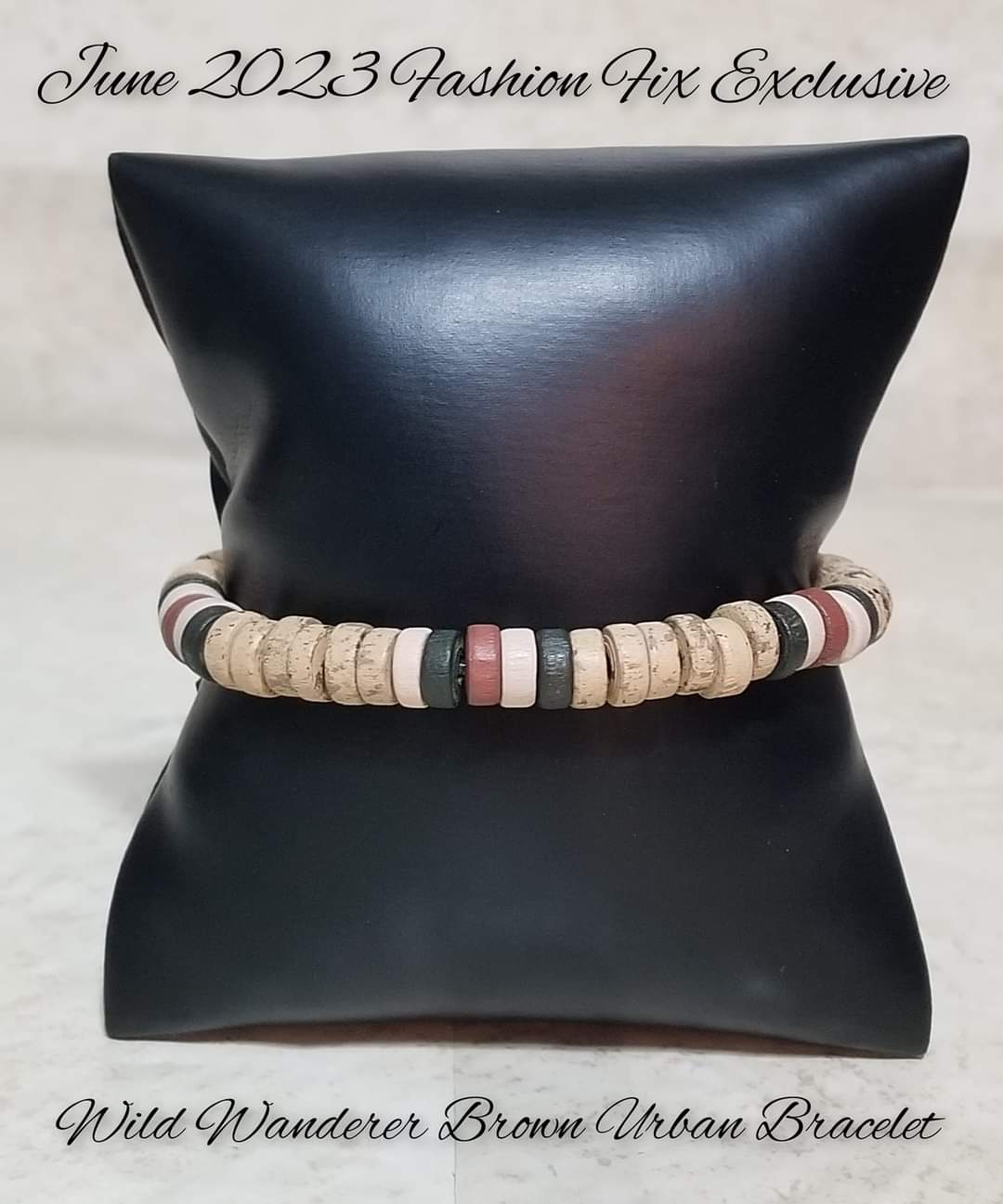 Wild Wanderer - Brown Urban Bracelet - Paparazzi Accessories - An earthy collection of green, white, brown, and speckled wooden discs are threaded along a brown cord around the wrist for an adventurous pop of color. Features an adjustable sliding knot closure. Sold as one individual bracelet.
