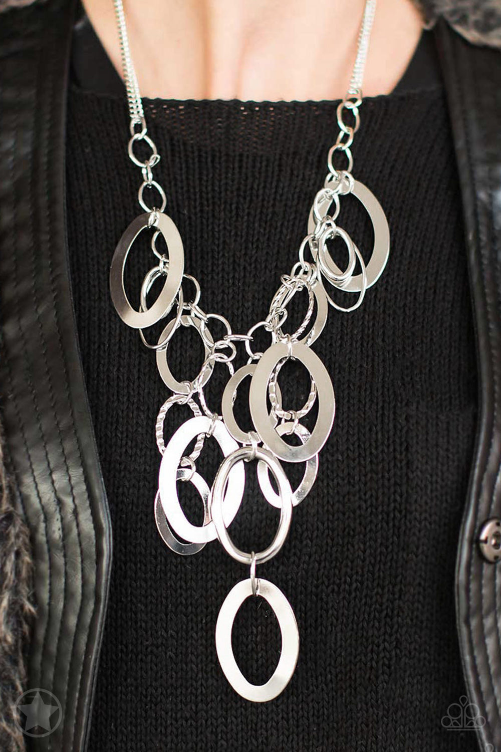 A Silver Spell - Silver Necklace and Earrings - Paparazzi Accessories - Large silver links and shimmering textured silver rings cascade below a silver chain freely, allowing for movement that makes a bold statement. Features an adjustable clasp closure. Sold as one individual necklace. Includes one pair of matching earring.