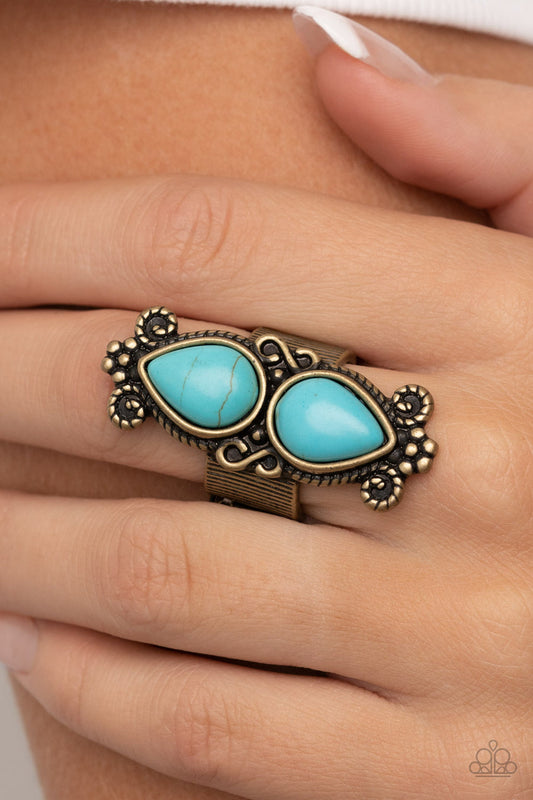 Adobe Garden - Brass Ring - Paparazzi Accessories - Brass ropelike filigree and studded floral details, a pair of turquoise stone teardrops point away from each other atop a ribbed brass band for an authentically artisan style ring.