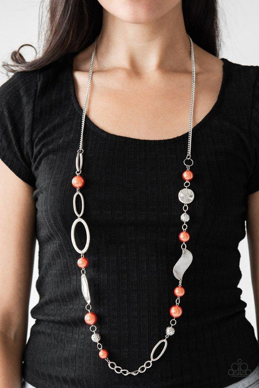 All About Me - Orange Pearl and Silver Necklace - Paparazzi Accessories - 
Oversized orange pearls, ornate silver beads, and an array of glistening silver accents trickle along a lengthened silver chain for a refined look. Features an adjustable clasp closure.
