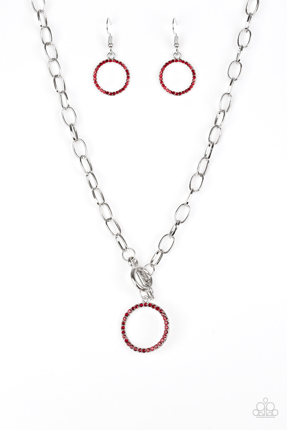 All In Favor - Red and Silver Necklace - Paparazzi Accessories - Encrusted in fiery red rhinestones, a bubbly silver pendant swings below the collar for a colorfully casual look. Features a toggle closure.