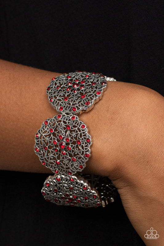 All in the Details - Red and Silver Bracelet - Paparazzi Accessories - Dotted with fiery red rhinestones, studded silver frames are filled with mandala-like filigree details and threaded along stretchy bands around the wrist for a glitzy pop of color. Sold as one individual bracelet.