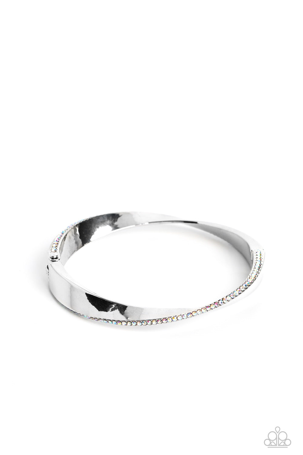 Artistically Adorned - Multi Iridescent - Silver Bracelet - Paparazzi Accessories - An oversized, warped, shiny silver bracelet wraps around the wrist in an artistic manner. A dainty row of iridescent rhinestones encrusts along the curves for an understated, elegant dazzle. Features a hinged closure. Sold as one individual bracelet.