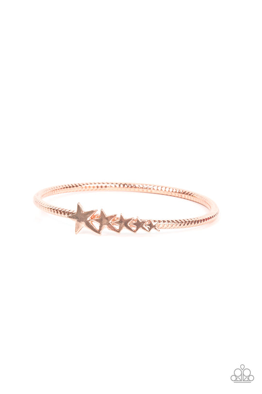 Astrological A-Lister - Copper Bracelet - Paparazzi Accessories - Shiny copper stars graduate in size across the center of a hammered shiny copper bangle, creating a stackable stellar centerpiece around the wrist. Sold as one individual bracelet.