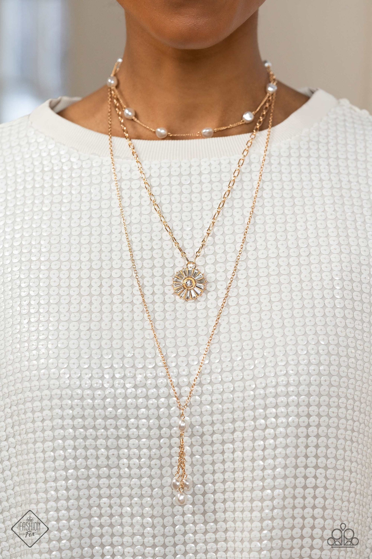 Audaciously Austen - Gold Pearl Necklace - Paparazzi Accessories - Three shimmery gold chains layer across the chest, with each strand featuring a different motif. Featured on the uppermost chain, white pearls sporadically dot a dainty gold chain. Below it, a gold paperclip chain with a circular pendant adorned in a classy collection of emerald-cut white gem bars fanning out. Finally, on the lowermost layer, baroque pearls drip into a flirtatious tassel, infusing the design with subtle movement.
