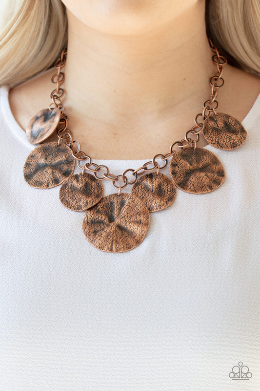 Barely Scratched The Surface - Copper Necklace - Paparazzi Accessories - Scratched in antiqued shimmer, warped copper discs swing from the bottom of a thick copper chain, creating a bold fringe below the collar. Features an adjustable clasp closure. Sold as one individual necklace.