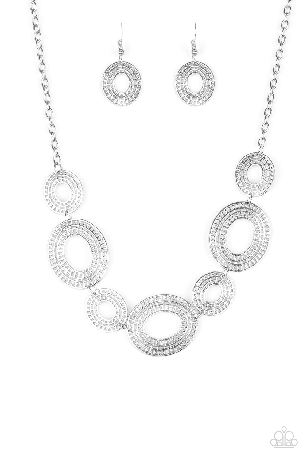Basically Baltic - Silver Necklace - Paparazzi Accessories - Radiating with circular details, airy oval frames link below the collar for a casual look. Features an adjustable clasp closure. Sold as one individual necklace. Includes one pair of matching earrings.