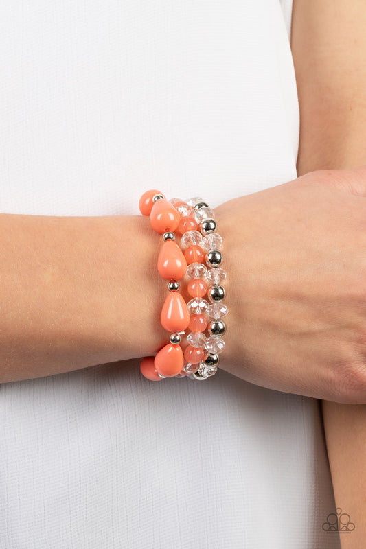 Beachside Brunch - Orange - Coral and Silver Stretchy Bracelets - Paparazzi Accessories - Assortment of crystal-like beads, silver beads, opaque coral beads, and coral teardrop beads are threaded along stretchy bands around the wrist, resulting in colorful layers.