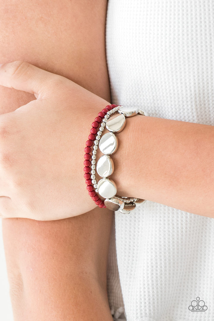 Beyond The Basics - Red and Silver Stretchy Bracelets - Paparazzi Accessories - Silver and red beads and round silver accents are threaded along stretchy bands, creating colorful fashion bracelet.