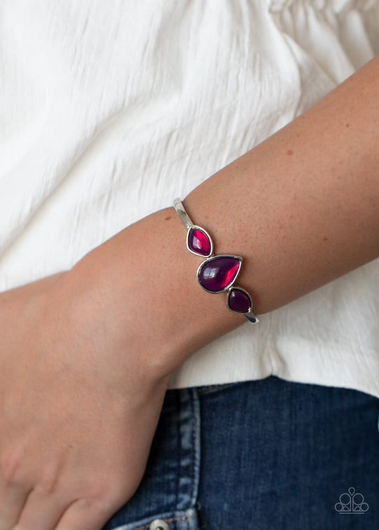 Boho Beach Babe - Purple and Silver Cuff Bracelet - Paparazzi Accessories - Oversized glassy purple stones are encrusted across the center of a dainty silver cuff, creating a colorful stylish fashion bracelet.