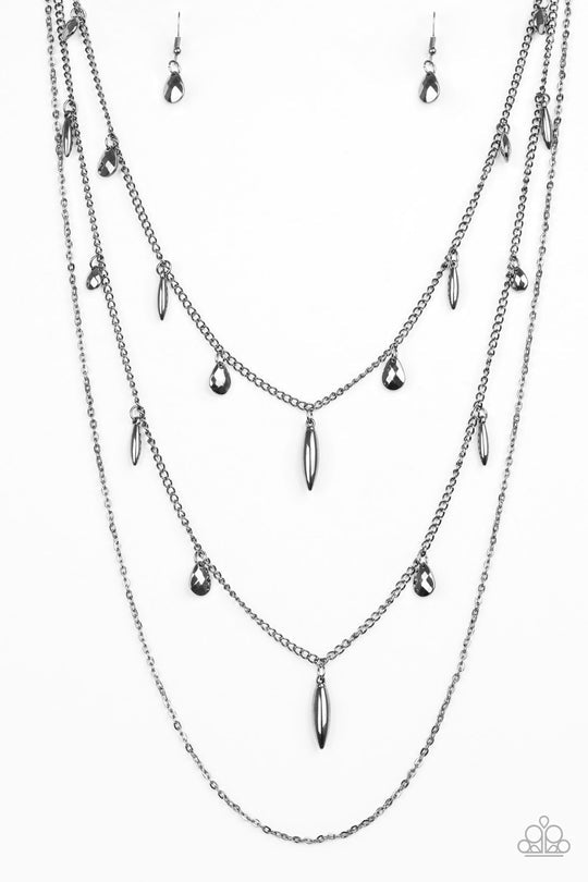 Bravo Bravado - Black Gunmetal Necklace - Paparazzi Jewelry  - Bejeweled Accessories By Kristie - Gunmetal teardrops and shiny gunmetal accents swing from two of the shimmery gunmetal chains for an edgy finish. This necklace has an adjustable clasp closure.