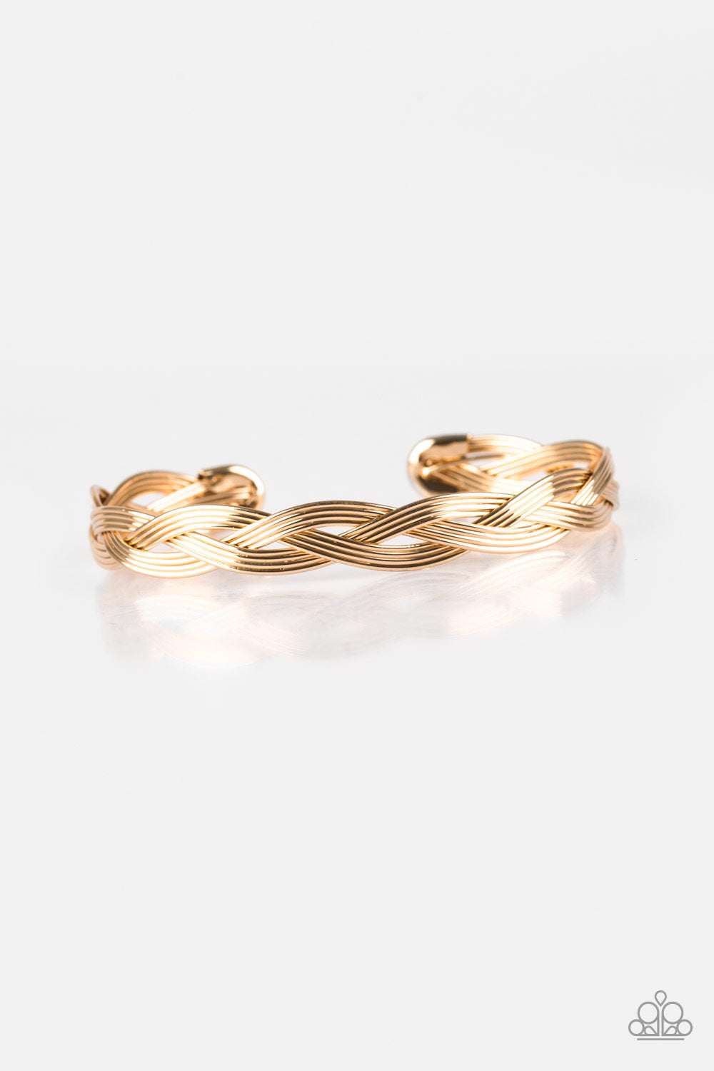Business As Usual - Gold Cuff Bracelet - Paparazzi Accessories - Glistening gold wires braid across the wrist, coalescing into a dainty cuff. Sold as one individual bracelet.Perfect for any occasion or an everyday look. Shop the gold collection for matching accessories.