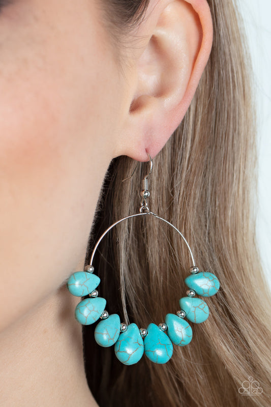 Canyon Quarry - Blue Turquoise and Silver Earrings - Paparazzi Accessories - Imperfect turquoise teardrop stones alternate with dainty silver beads along a wire hoop, resulting in an adventurous fringe. Earring attaches to a standard fishhook fitting. Sold as one pair of earrings.