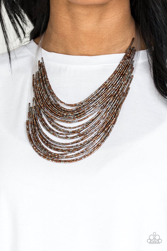 Catwalk Queen - Multi (Copper - Gunmetal)  Seed Bead Fashion Necklace - Paparazzi Accessories - Strand after strand of metallic copper and gunmetal seed beads fall together to create a bold statement piece. Features an adjustable clasp closure.
