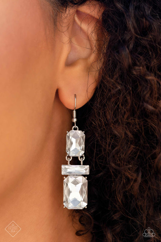 CHAIN Check - White and Silver Earrings - Paparazzi Accessories - Two oversized emerald-cut gems sparkle unapologetically, increasing in size as they fall from the ear. A white gem bar, featuring sharp faceted surfaces, lays perpendicular to the blinding emerald-cut gems, separating the two and emphasizing their hinged movement. 