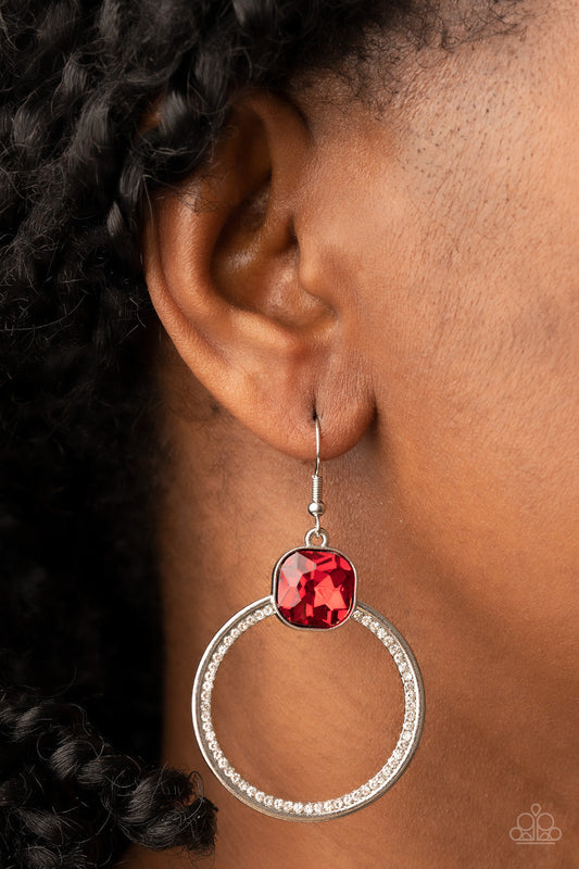 Cheers to Happily Ever After - Red Gem and Silver Earrings - Paparazzi Accessories - An oversized red gem sits atop a silver hoop with an inner ring encrusted in glitzy white rhinestones, resulting in a timeless twinkle. Earring attaches to a standard fishhook fitting. Trendy fashion jewelry for everyone.