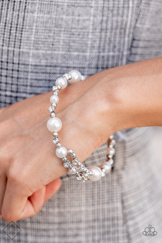 Chicly Celebrity - White Pearl - Rhinestone Infinity Wrap Bracelet - Paparazzi Accessories - Bubbly pearls and brilliant white rhinestones are accented with shiny silver beads threaded along a single wire to create a chicly glamorous infinity wrap bracelet.