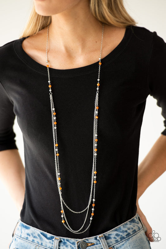 Colorful Cadence - Orange and Silver Necklace - Paparazzi Accessories - Faceted silver and glassy orange beads trickle along shimmery silver chains down the chest for a whimsical style necklace.